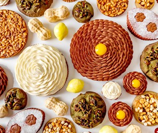 Brown, green, yellow and beige cakes by Cedric Grolet